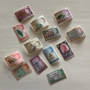 Stamps # 8 | this Listing includes EIGHT Cayman Island Queen Elizabeth ll stamps